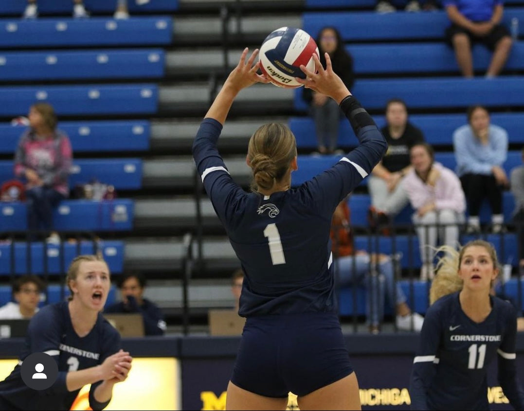Kinetic Arm being worn in volleyball game under uniform